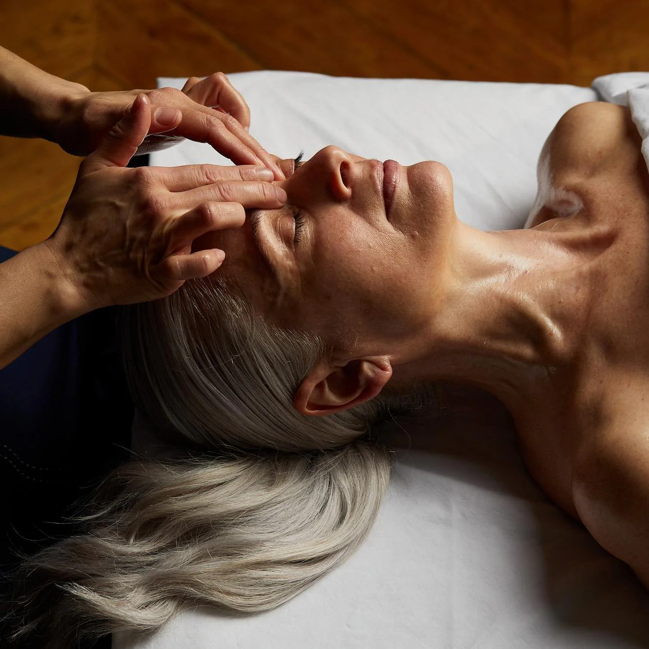 Relaxing facial therapy at Flow Lymphatic Newport Beach